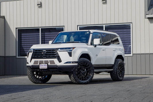 2026 Lexus GX550 Premium+ with a 2.5" Readylift lift kit, 22x9.5 Vossen HFX1 wheels, and 285/55 Toyo Open Country R/T Trail tires.
