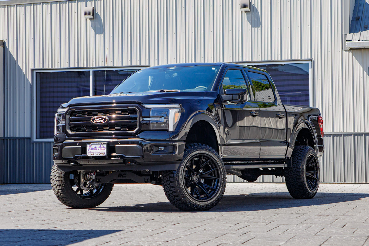2026 Ford F-150 Lariat with a 6" Rough Country lift kit, 22x12 Fuel Catalyst wheels, and 35" Fury Country Hunter R/T tires.