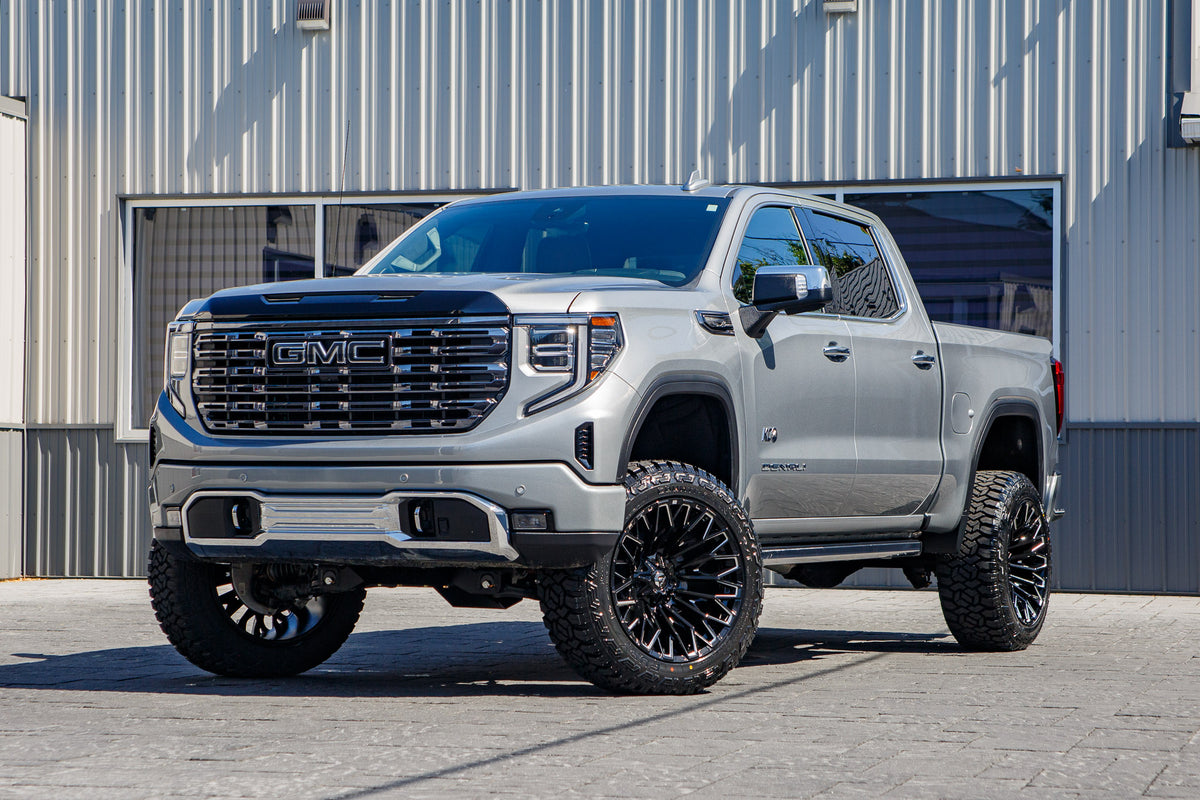 2026 GMC Sierra 1500 Denali with a 6" BDS lift kit, 22x12 Fuel Strike wheels, and 35" Fury Country Hunter R/T tires.