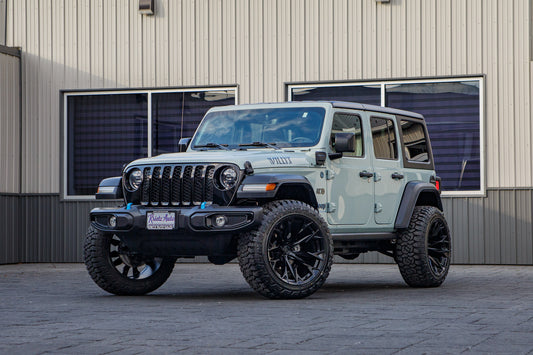 2023 Jeep Wrangler Willys 4XE with a 2.5" Rough Country lift kit, 322x12 Fuel Flame wheels, and 35" Fury Country Hunter R/T tires.