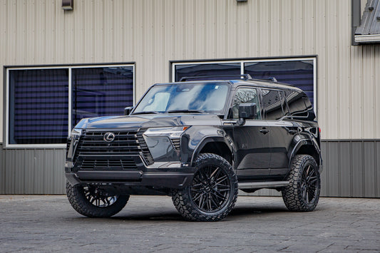 2026 Lexus GX550 Premium+ with a 2.5" ReadyLift lift kit, 22x9.5 Vossen HF65 wheels, and 285/55 Toyo Open Country R/T Trail tires.