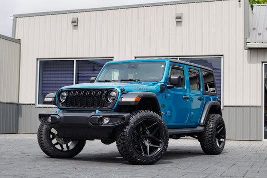 2024 Jeep Wrangler Sahara 4XE with a 2.5" Rough Country lift kit, 22x12 Fuel Flux wheels, and 35" Fury Country Hunter R/T tires.