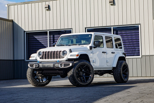 2024 Jeep Wrangler Sahara 4XE with a 2.5" Rough Country lift kit, 22x12 Fuel Flux wheels, and 35" Avix Trailtek R/T tires.