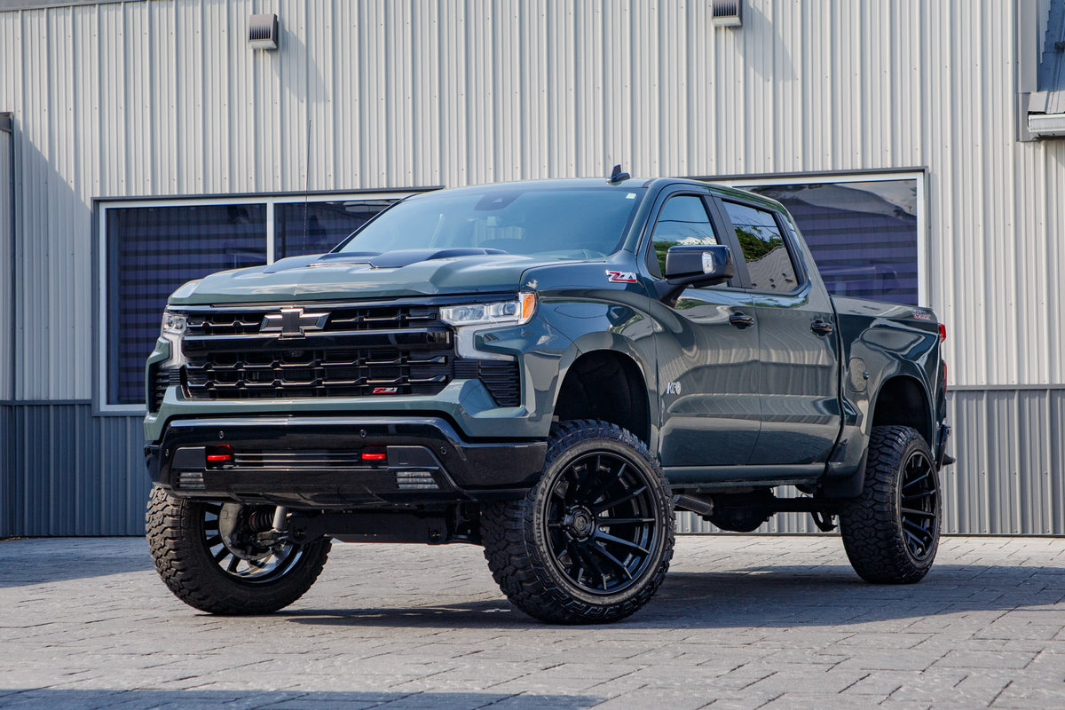 2026 Chevrolet Silverado 1500 LT Trail Boss with a 6" Rough Country lift kit, 22x12 Fuel Burn wheels, and 35" Fury Country Hunter R/T tires.