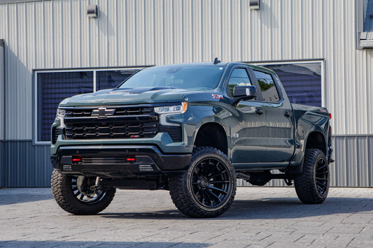 2026 Chevrolet Silverado 1500 LT Trail Boss with a 6" Rough Country lift kit, 22x12 Fuel Burn wheels, and 35" Fury Country Hunter R/T tires.