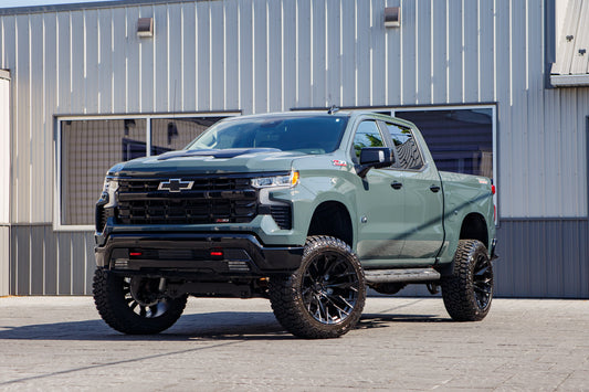 2026 Chevrolet Silverado 1500 LT Trail Boss with a 6" Rough Country lift kit, 22x12 Fuel Flame wheels, and 35" Fury Country Hunter R/T tires.