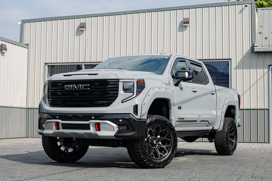 2024 GMC Sierra 1500 AT4 with a 6" Rough Country lift kit, 20x10 4Play 4P83 wheels, and 35" Mickey Thompson Baja Boss A/T tires.