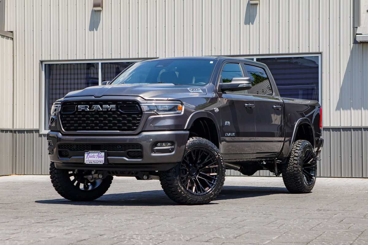 2026 Ram 1500 Lone Star with a 6" Rough Country lift kit, 22x12 Fuel Rebar wheels, and 35" Fury Country Hunter R/T tires.
