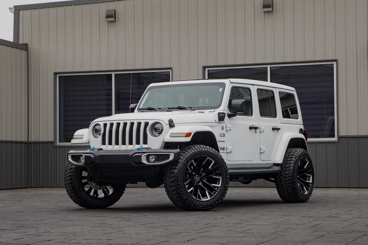 2024 Jeep Wrangler Sahara 4XE with a 2.5" Rough Country lift kit, 22x12 Fuel Rebar wheels, and 35" Avix Trailtek R/T tires.