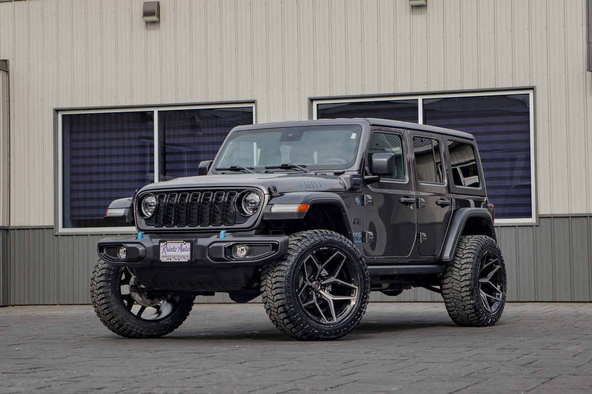 2024 Jeep Wrangler Sport S 4XE with a 2.5" Rough Country lift kit, 22x12 Fuel Flux wheels, and 35" Avix Trailtek R/T tires.