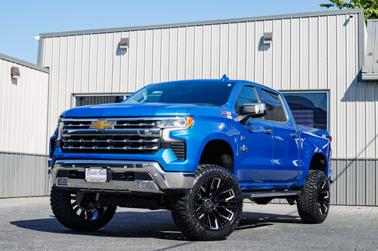 2024 Chevrolet Silverado 1500 LTZ with a 6" Rough Country lift kit, 22x12 Fuel Rebar wheels, and 35" Fury Country Hunter R?T tires.