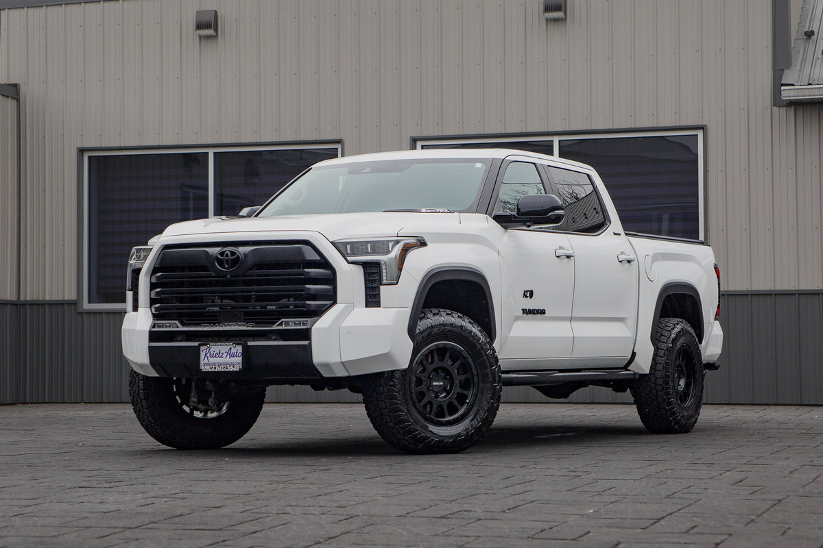 2024 Toyota Tundra Limited with a 6" Rough Country lift kit, 18x9 Method 305 Standard wheels, and 285/75 Toyo Open Country A/T III tires.