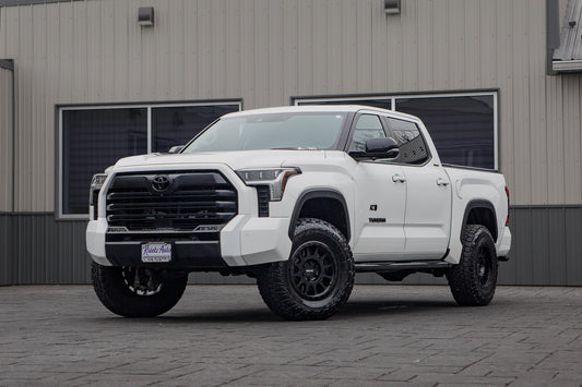 2024 Toyota Tundra Limited with a 6" Rough Country lift kit, 18x9 Method 305 Standard wheels, and 285/75 Toyo Open Country A/T III tires.