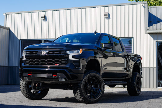2025 Chevrolet Silverado 1500 LT Trail Boss with a 6" Rough Country lift kit, 22x12 Fuel Catalyst wheels and 35" Avix Trailtek R/T tires.