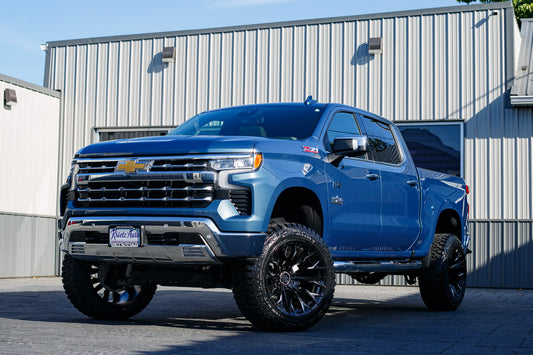 2024 Chevrolet Silverado 1500 LTZ with a 6" Rough Country lift kit, 22x12 Fuel Flame wheels, and 35" Fury Country Hunter R/T tires.