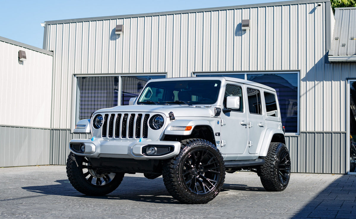 2023 Jeep Wrangler Sahara 4XE with a 2.5" Rough Country lift kit, 22x12 Fuel Rebar wheels, and 35" Fury Country Hunter tires.