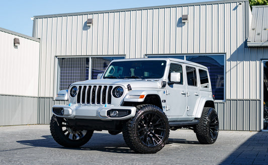 2023 Jeep Wrangler Sahara 4XE with a 2.5" Rough Country lift kit, 22x12 Fuel Rebar wheels, and 35" Fury Country Hunter tires.