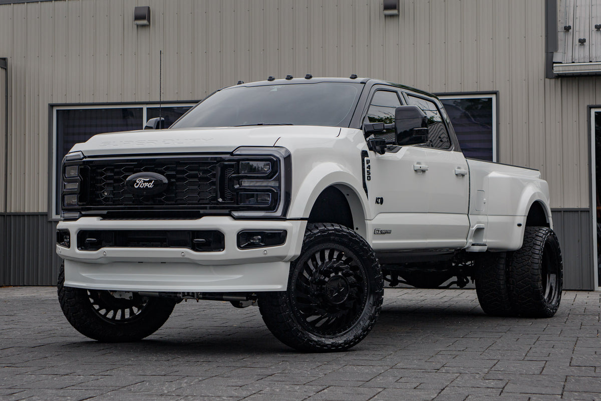 2026 Ford F-450 Super Duty Platinum with a 4" Wicked lift kit, 24x8.25 American Force Riptide wheels, and 37" Toyo Open Country R/T Trail tires.