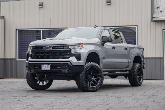 2025 Chevrolet Silverado 1500 LT Trail Boss with a 6" Rough Country lift kit, 22x12 Fuel Flux wheels, and 35" Fury Country Hunter R/T tires.
