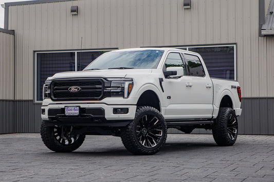 2026 Ford F-150 Lariat with a 6" Rough Country lift kit, 22x12 Fuel Rebar wheels, and 35" Fury Country Hunter R/T tires.
