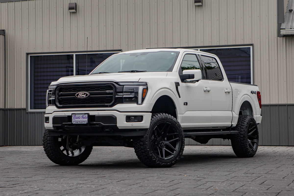 2026 Ford F-150 Lariat with a 6" Rough Country lift kit, 22x12 Fuel Flux wheels, and 35" Fury Country Hunter R/T tires.