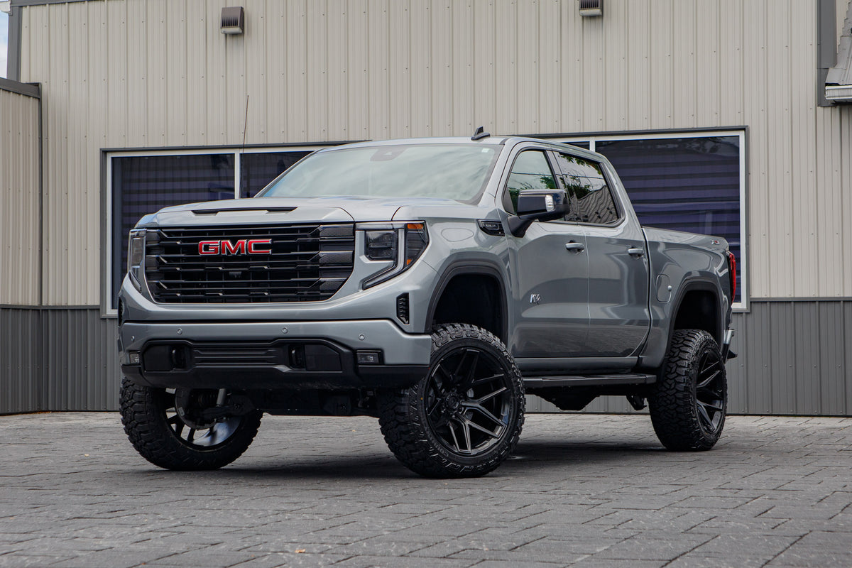 2026 GMC Sierra 1500 Elevation with a 6" Rough Country lift kit, 22x12 Fuel Flux wheels, and 35" Fury Country Hunter R/T tires.