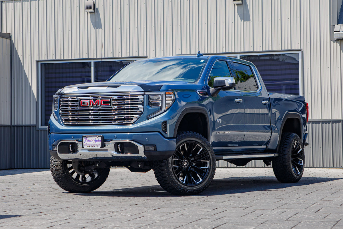 2024 GMC Sierra 1500 Denali with a 6" Rough Country lift kit, 22x12 Fuel Rebar wheels, and 35" Fury Country Hunter R/T tires.