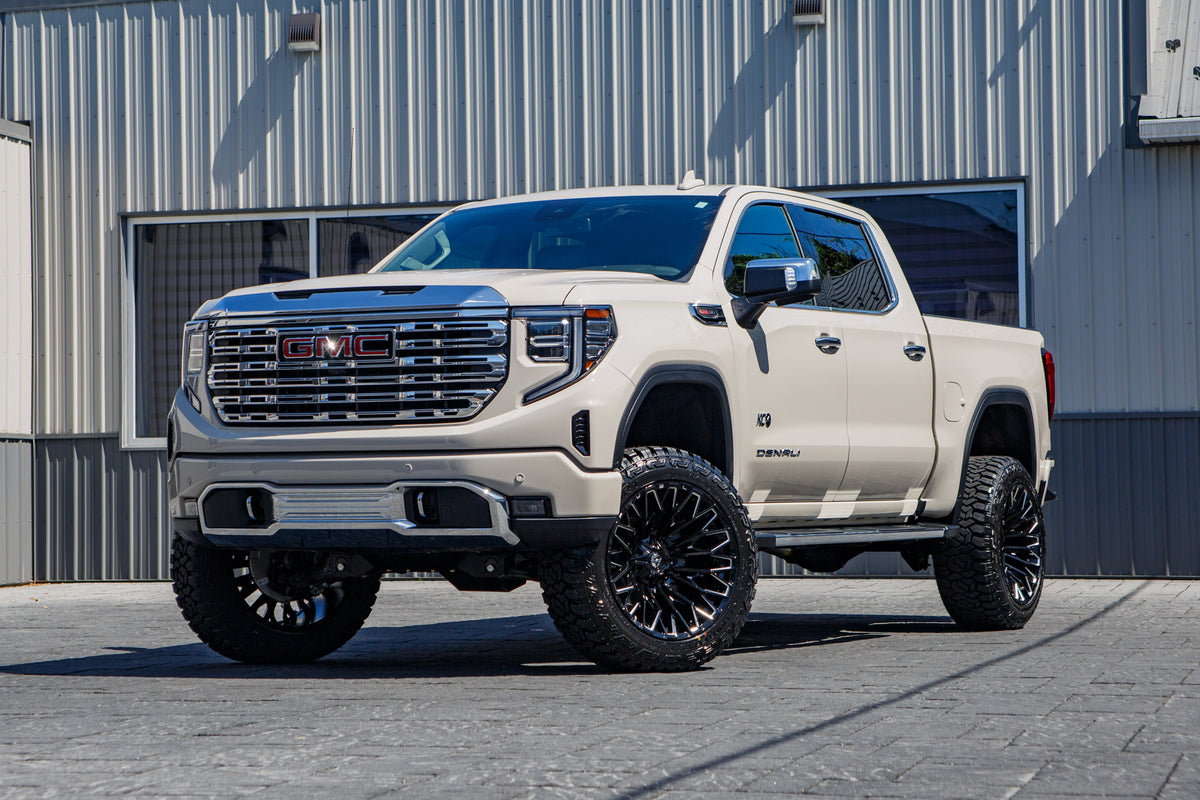 2026 GMC Sierra 1500 Denali with a 6" BDS lift kit, 22x12 Fuel Strike wheels, and 35" Fury Country Hunter R/T tires.
