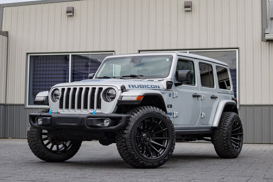 2022 Jeep Wrangler Unlimited Rubicon 4XE with Jeep Stock suspension, 22x12 Fuel Burn wheels, and 35" Avix Trailtek R/T tires.