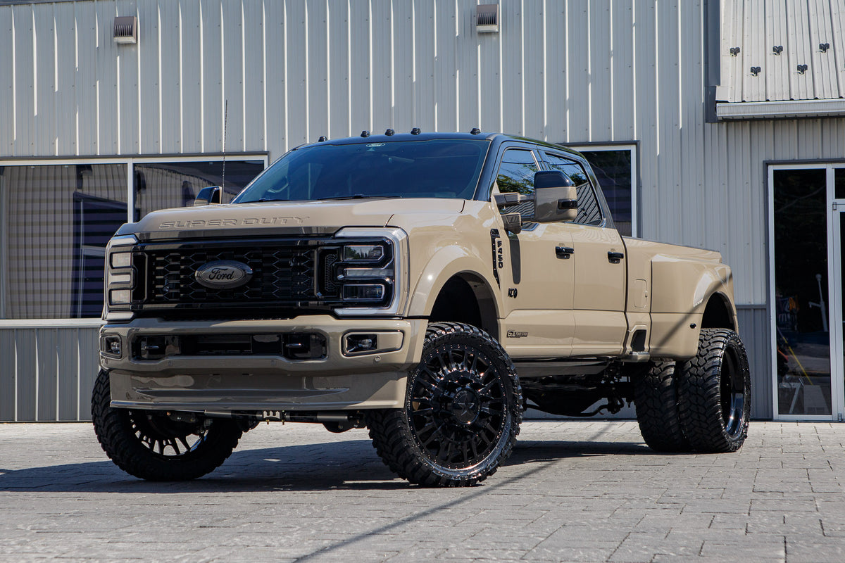 2026 Ford F-450 Super Duty Platinum with a 4" Wicked lift kit, 26x8.25 American Force Notch wheels, and 37" AMP Terrain Attack M/T A tires.