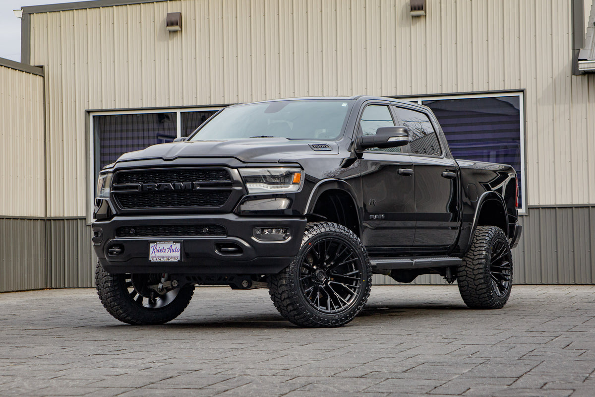 2022 Ram 1500 Big Horn with a 6" Rough Country lift kit, 22x12 Fuel Rebar wheels, and 35" Avix Trailtek R/T tires.