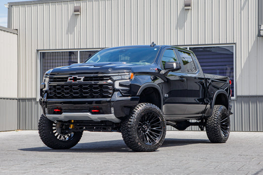 2026 Chevrolet Silverado 1500 ZR2 with a 4" ReadyLift lift kit, 22x12 Hostile Justice wheels, and 35" Fury Country Hunter R/T tires.