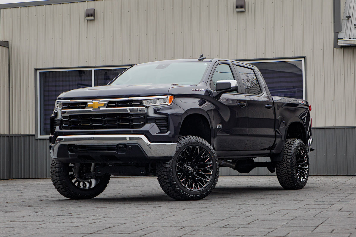 2024 Chevrolet Silverado 1500 LT with a 6" Rough Country lift kit, 22x12 Fuel Strike wheels, and 35" Fury Country Hunter R/T tires.