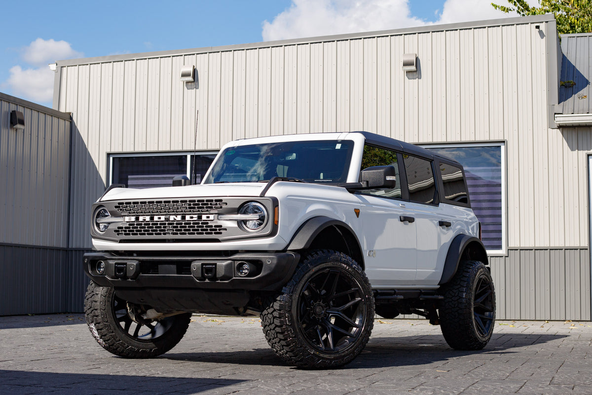 2023 Ford Bronco Badlands with a 2.5" Rough Country lift kit, 22x12 Fuel Flux wheels, and 35" Fury Country Hunter R/T tires.