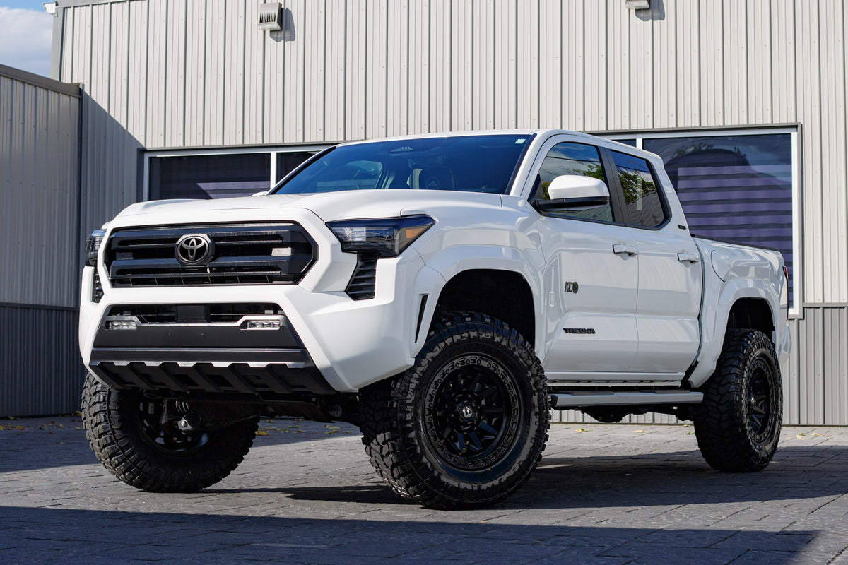 2025 Toyota Tacoma SR5 with a ReadyLift 3" lift kit, 18x9 Fuel Covert wheels, and 35" Avix Trailtek R/T tires.