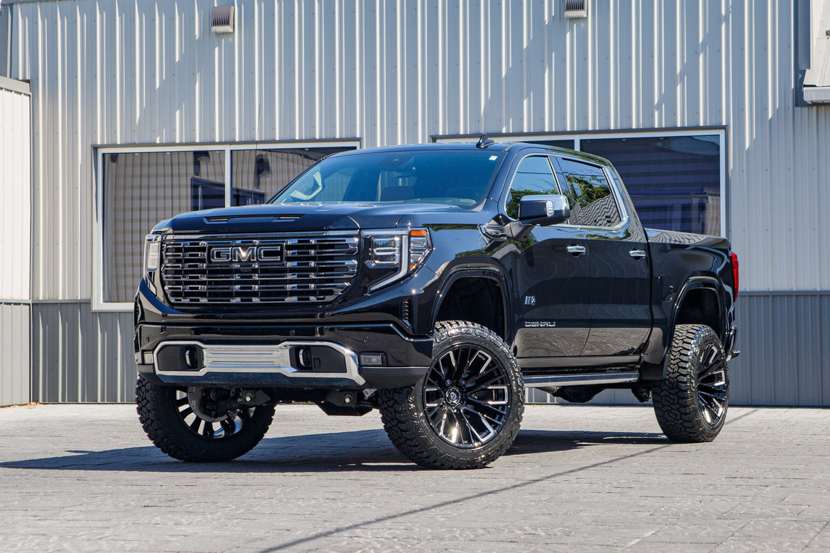 2026 GMC Sierra 1500 Denali with a 6" BDS lift kit, 22x12 Fuel Rebar wheels, and 35" Fury Country Hunter R/T tires.