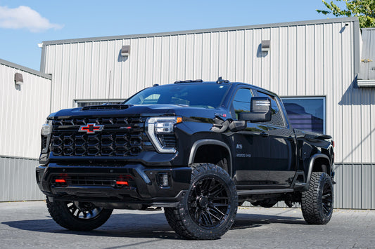 2025 Chevrolet Silverado 2500 ZR2 with Chevrolet Stock suspension, 22x12 Arena Battle wheels, and 35" Nitto Ridge Grappler tires.