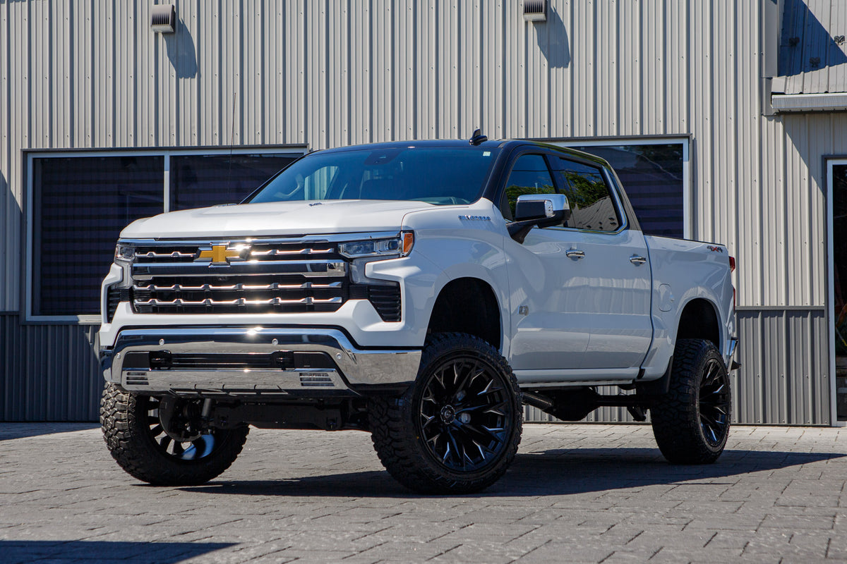 2026 Chevrolet Silverado 1500 LTZ with a 6" Rough Country lift kit, 22x12 Fuel Flame wheels, and 35" Fury Country Hunter R/T tires.