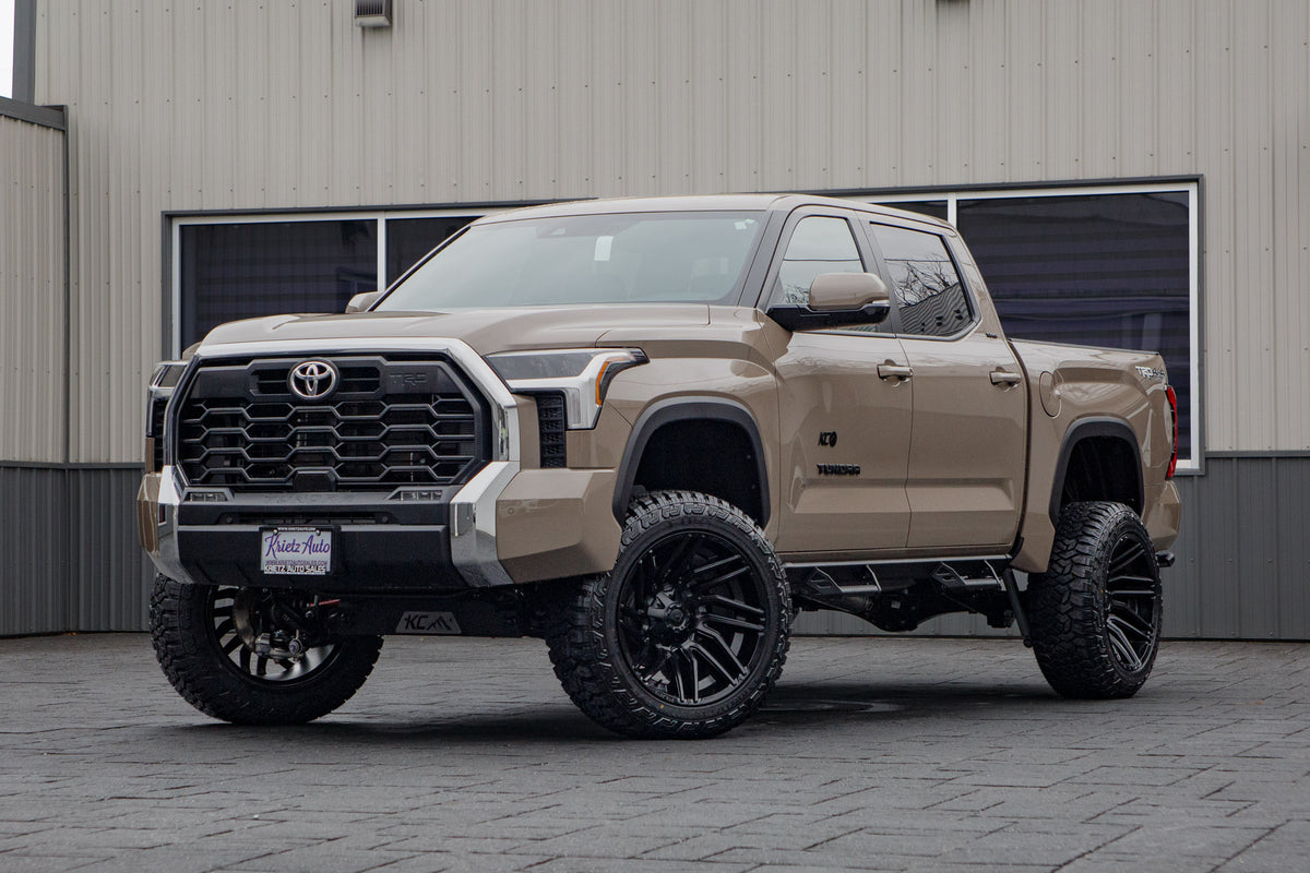 2026 Toyota Tundra SR with a 6" Rough Country lift kit, 22x12 Fuel Typhoon wheels, and 35" Fury Country Hunter R/T tires.