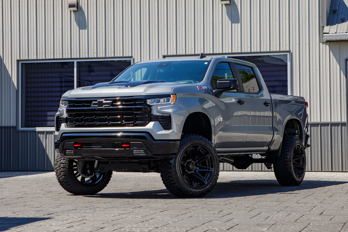 2026 Chevrolet Silverado 1500 LT Trail Boss with a 6" Rough Country lift kit, 22x12 Fuel Brawl wheels, and 35" Fury Country Hunter R/T tires.