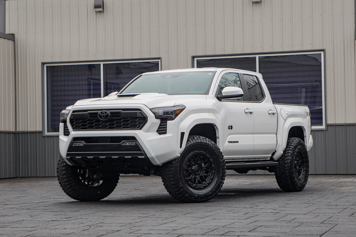 2025 Toyota Tacoma TRD Off-Road with a 3" ReadyLift lift kit, 18x9 Fuel Surge wheels, and 35" Avix Trailtek R/T tires.