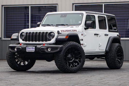 2025 Jeep Wrangler Rubicon with Jeep Stock suspension, 22x12 Fuel Twitch wheels, and 35" Avix Trailtek R/T tires.