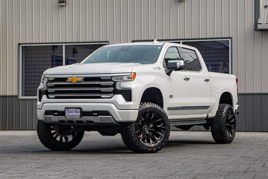 2025 Chevrolet Silverado 1500 High Country with a 6" BDS lift kit, 22x12 Fuel Flame wheels, and 35" Fury Country Hunter R/T tires.
