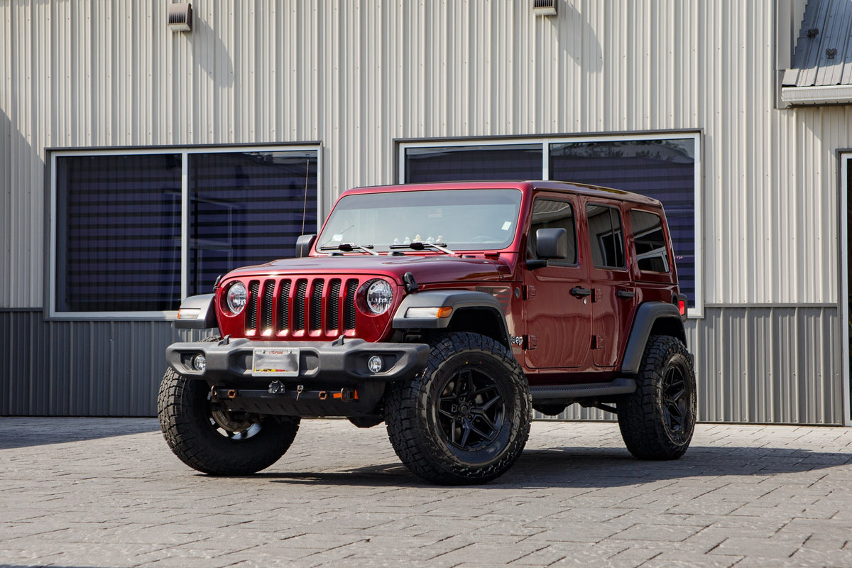 2021 Jeep Wrangler Unlimited Sport with a 2.5" Rough Country lift kit, 17x9 Fuel Flux wheels, and 35" Falken Wildpeak A/T4W tires.