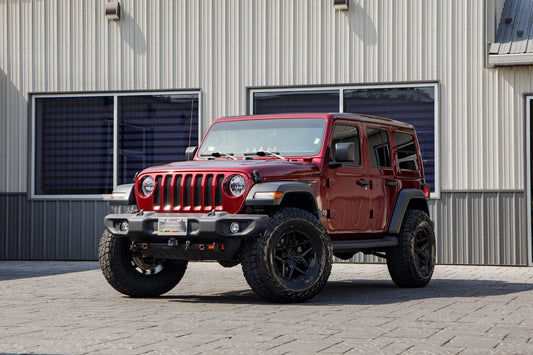 2021 Jeep Wrangler Unlimited Sport with a 2.5" Rough Country lift kit, 17x9 Fuel Flux wheels, and 35" Falken Wildpeak A/T4W tires.