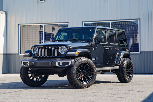 2025 Jeep Wrangler Sahara 4XE with a 2.5" Rough Country lift kit, 22x12 Fuel Rebar wheels, and 35" Fury Country Hunter R/T tires.