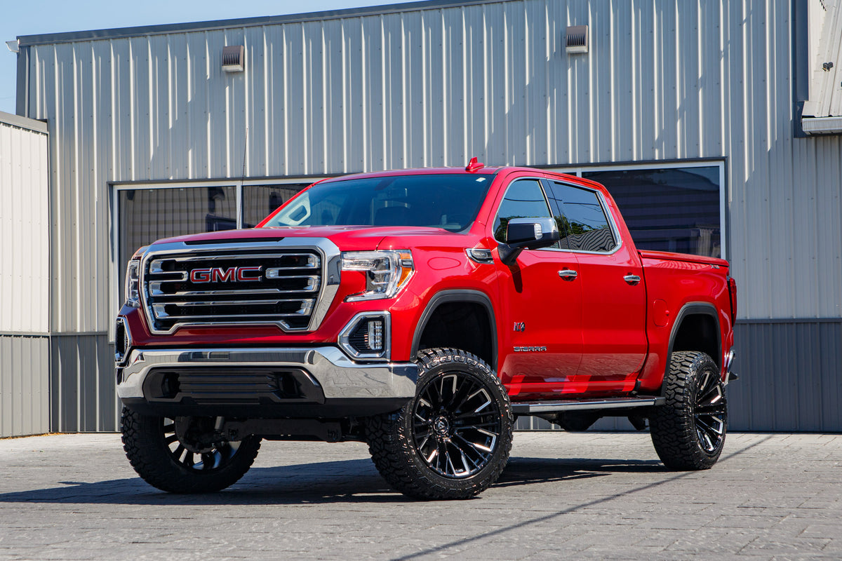2021 GMC Sierra 1500 SLT with a 6" Rough Country lift kit, 22x12 Fuel Rebar wheels, and 35" Fury Country Hunter R/T tires.
