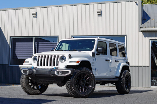 2023 Jeep Wrangler Sahara 4XE with a 2.5" Rough Country lift kit, 22x12 Fuel Rebar wheels, and 35" Avix Trailtek R/T tires.
