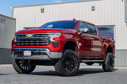 2024 Chevrolet Silverado 1500 LTZ with a 6" Rough Country lift kit, 22x12 Fuel Strike wheels, and 35" Fury Country Hunter tires.