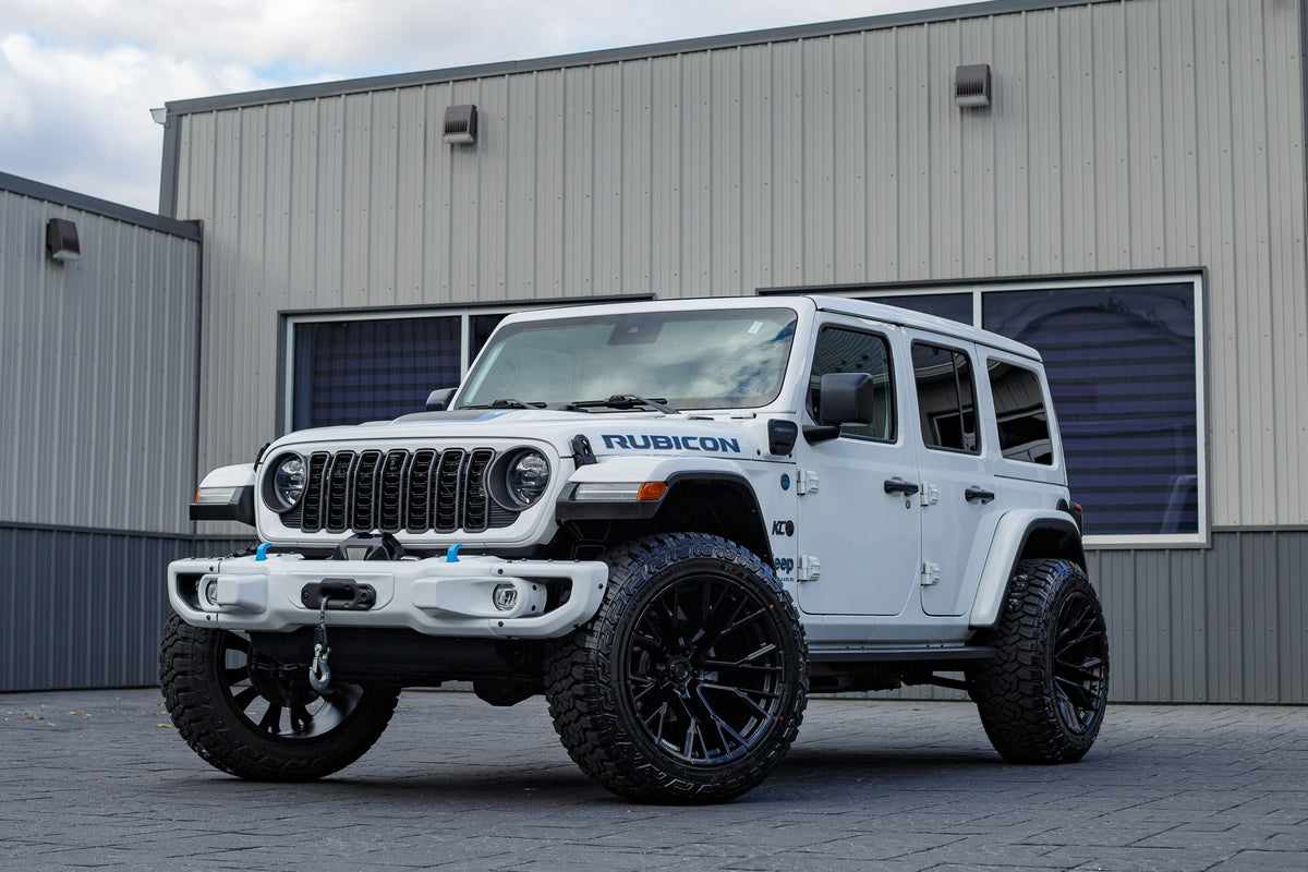 2024 Jeep Wrangler Rubicon 4XE with Jeep Stock suspension, 22x12 Fuel Rebar wheels, and 35" Fury Country Hunter R/T tires.
